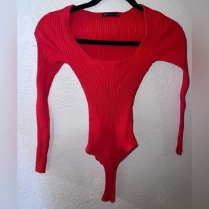 long sleeve , stretchy bodysuit